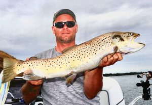 Michael Evans with a 3.4 kg brown trout from Lake Purrumbete (Picture: Victorian Inland Charters, South West).   