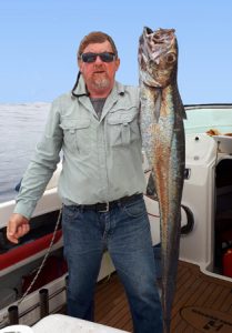 Lachie Wombell with a blue grenadier that he caught offshore from Portland (Picture: Bob McPherson).   