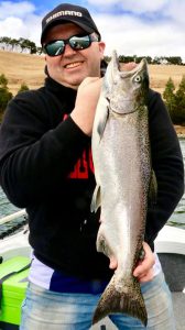 John Jovanovic with his chinook salmon (Picture: Victorian Inland Charters, South West).   