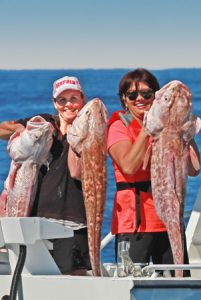 Keryn Millard and Adriana Nedelcu with a sample of their spotted ling catch from the wide grounds off Portland (Picture: Bob McPherson).