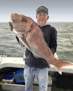 Col Erard with the 9.5 kg snapper that he caught in the rain off Leopold on Saturday morning (Picture: Malcolm Erard).