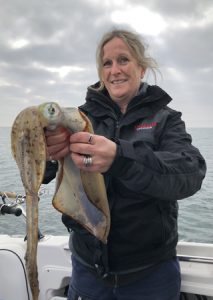 Linda Stewart with a squid she caught off Curlewis on Sunday (Picture: Murray Stewart).