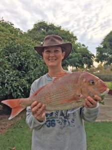 Deb Wilson, with a sample of hers, and husband Ted’s respective bag limit catches of snapper taken off Barwon Heads on Saturday morning.