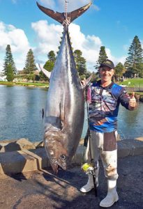 Matt Cini of Reeltime Charters with a 111 kg tuna from Portland (Picture: Bob McPherson).