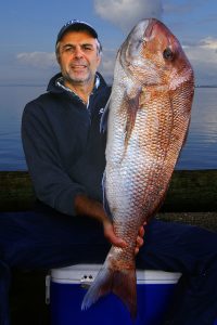 Damir Lukesic with the 9.5 kg snapper he caught from Corio Bay on Saturday morning.