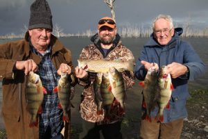 From left, John Hall, Wayne Rigg and Chris Rigg with their catch from Lake Toolondo after Tuesday’s storm (Picture: Victorian Inland Charters).